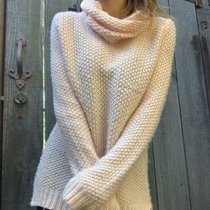 Pink turtleneck sweater